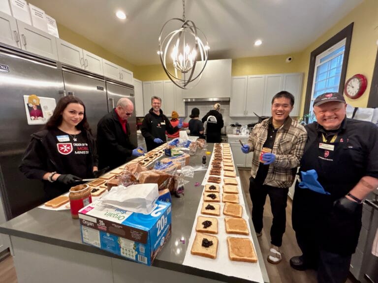Serving Breakfast to Homeless in Venice